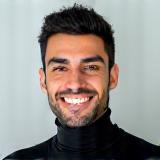 Portrait of Omar F. smiling